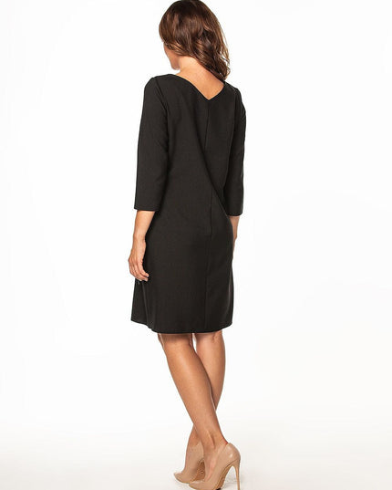 Robe élégante noire à manches 3/4