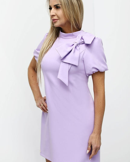 Robe rose avec nœud épaule