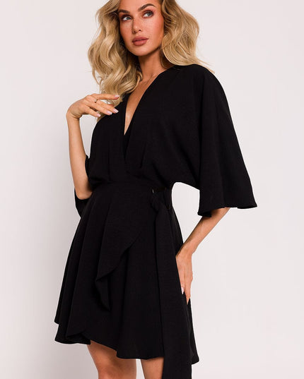 Robe verte manches chauve-souris