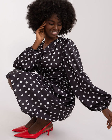 Robe cocktail à pois élégante