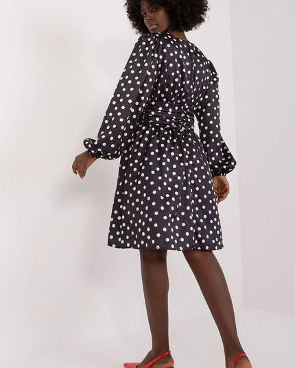 Robe cocktail à pois élégante