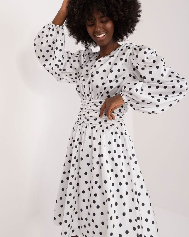Robe cocktail à pois élégante