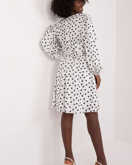 Robe cocktail à pois élégante