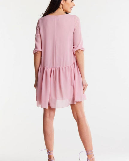 Robe ample en mousseline rose