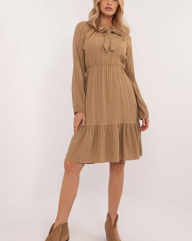 Robe évasée beige avec volant