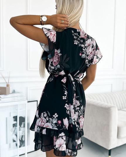 Robe blanche à fleurs roses