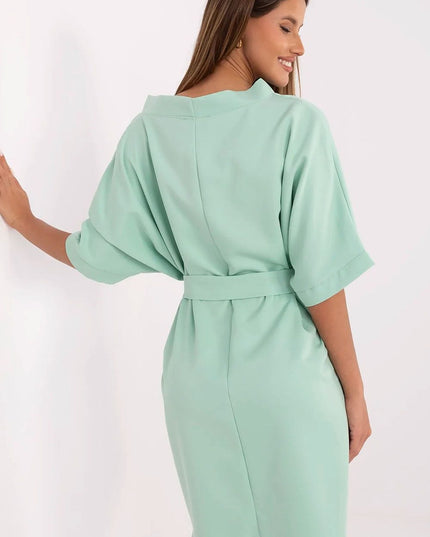 Robe élégante ajustée avec ceinture