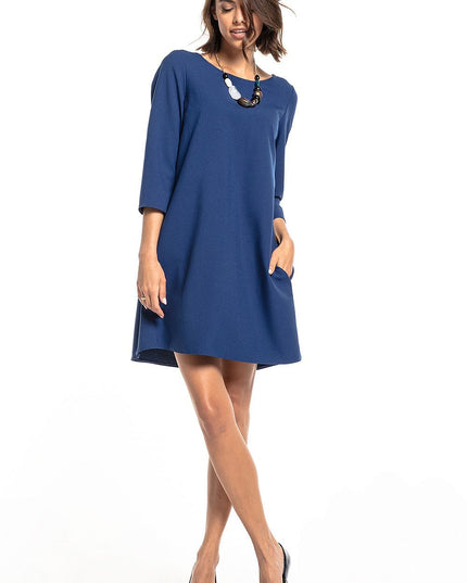Robe verte plissée avec poches