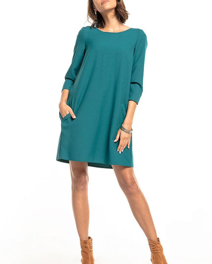 Robe verte plissée avec poches