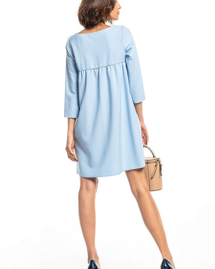 Robe verte plissée avec poches