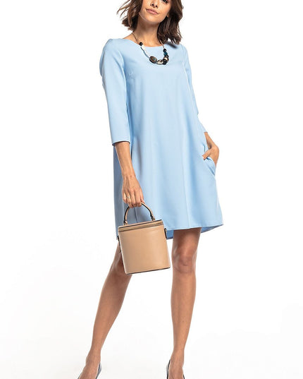 Robe verte plissée avec poches