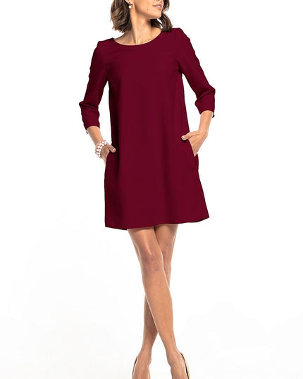 Robe verte plissée avec poches