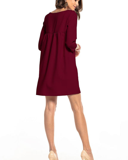 Robe verte plissée avec poches