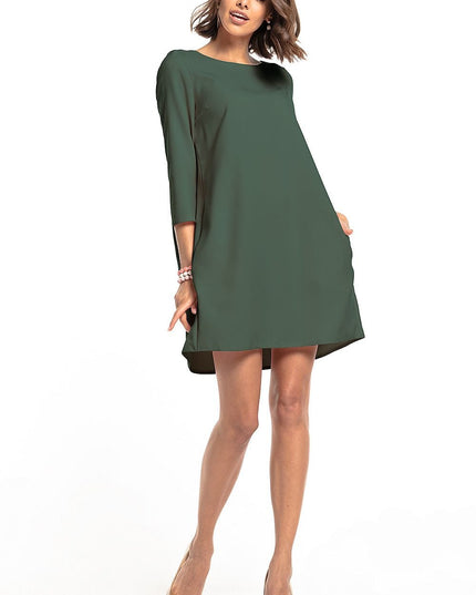 Robe verte plissée avec poches