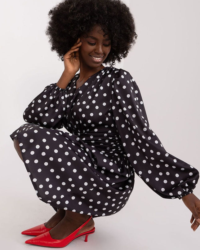 Robe cocktail à pois élégante