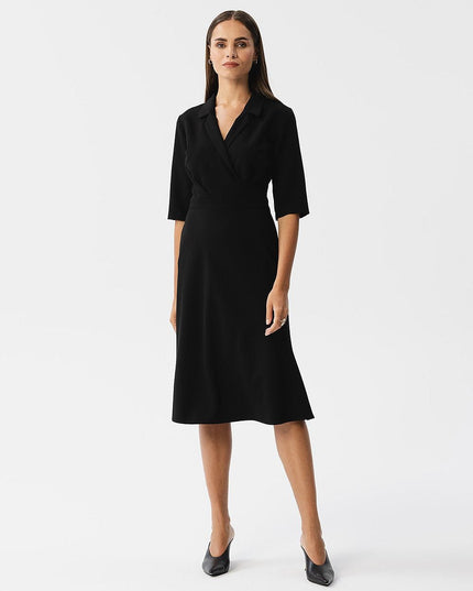 Robe verte élégante au col croisé