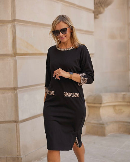 Robe élégante noire motifs léopard